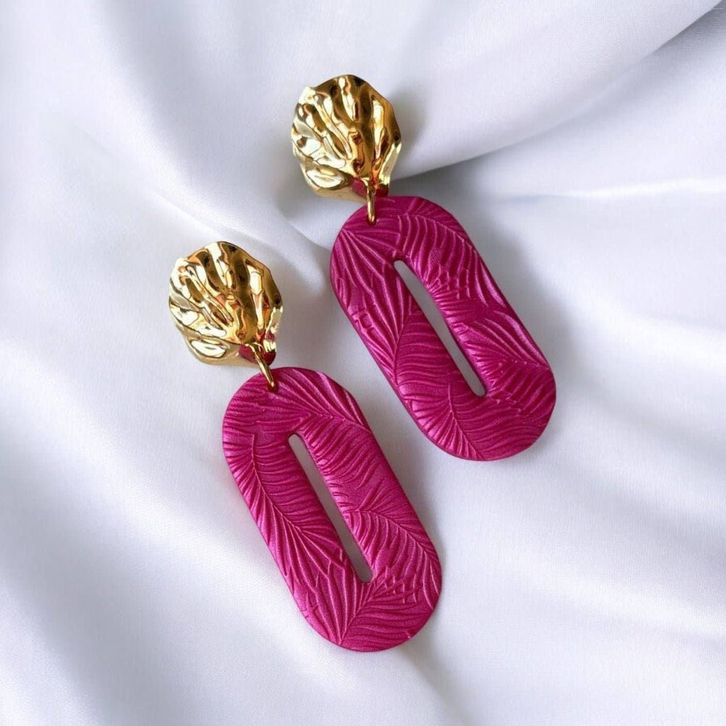 Boucles d'oreilles ovales fuchsia en argile polymère