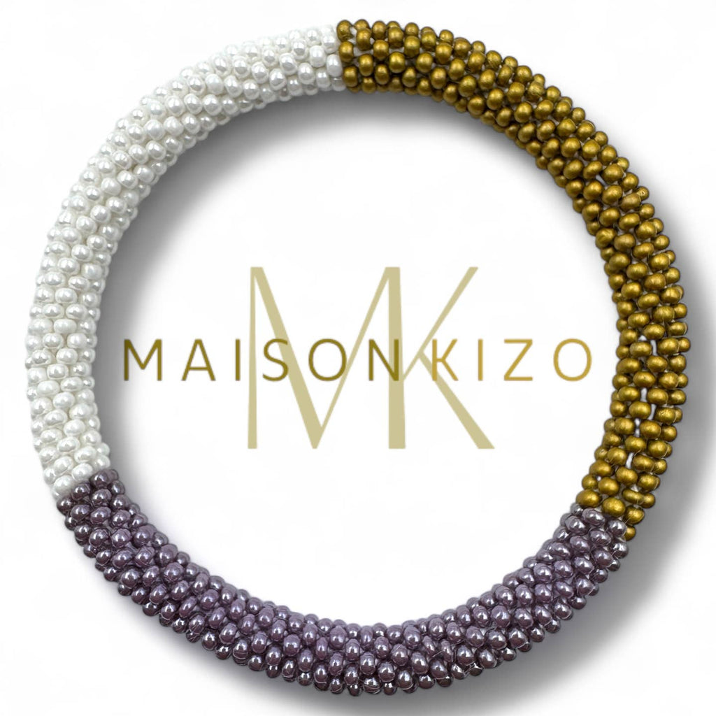 Bracelet mauve blanc et doré perles népalaises